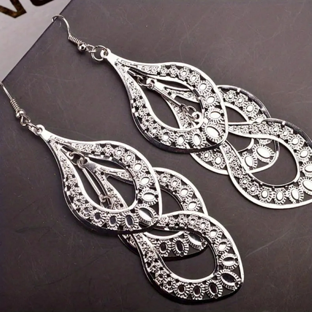 Multi layer dangle earrings. Silver tone